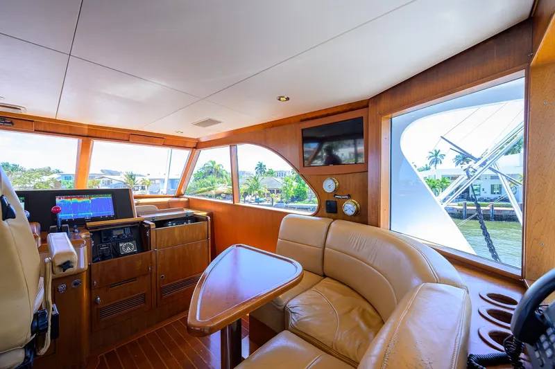 Slide: The Image of Luxurious 1985 Feadship Yacht Fisherman interior with leather seating and navigation equipment. - 41
