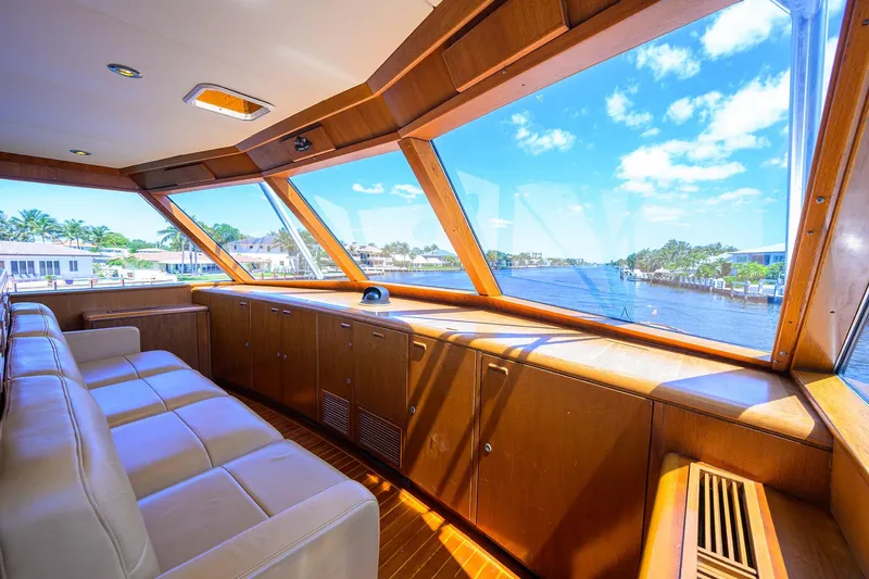 Slide: The Image of Luxurious 1985 Feadship Yacht Fisherman interior with panoramic waterway views. - 42