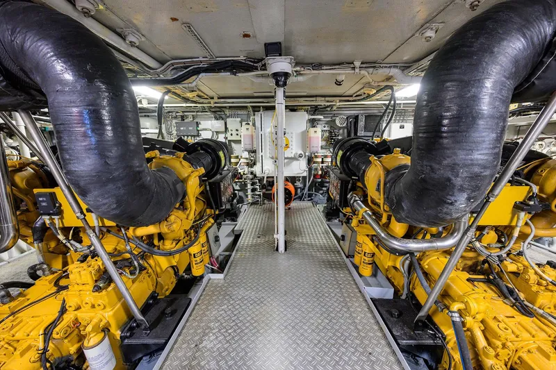 Slide: The Image of Engine room of 1985 Feadship Yacht Fisherman with dual Caterpillar engines. - 65