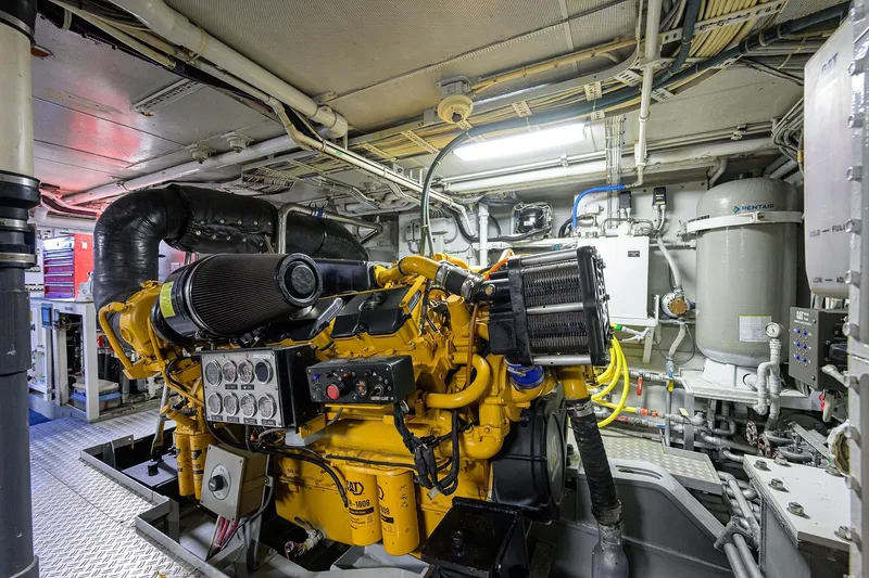 Slide: The Image of Engine room of 1985 Feadship Yacht Fisherman, showcasing machinery and equipment. - 73