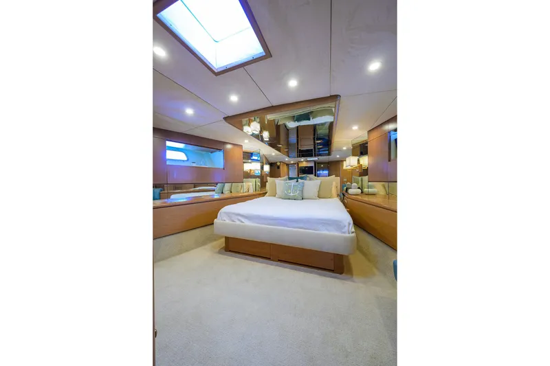 Slide: The Image of Luxurious bedroom interior of 1985 Feadship Yacht Fisherman with modern design and ambient lighting. - 77