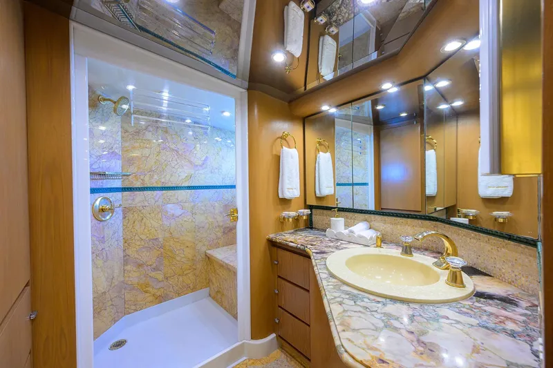 Slide: The Image of Luxurious 1985 Feadship Yacht Fisherman bathroom with marble shower and elegant fixtures. - 84