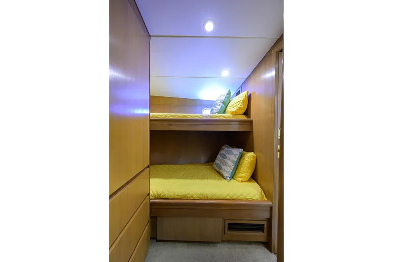 Slide: The Image of Bunk beds with yellow bedding in 1985 Feadship Yacht Fisherman cabin. - 90