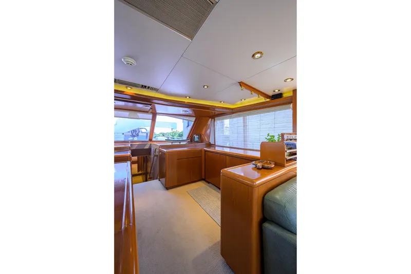 Slide: The Image of Luxurious interior of 1985 Feadship Yacht Fisherman with elegant wood finishes and modern lighting. - 97