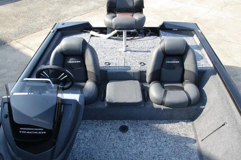 Slide: The Image of 2026 Tracker Pro Team 195 Tournament Edition boat interior with seating and steering console. - 6