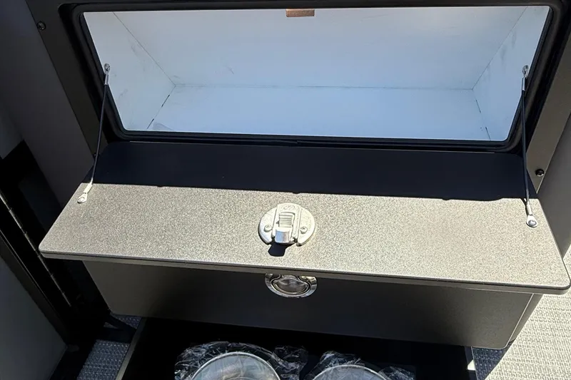 Slide: The Image of Storage compartment of 2026 Viaggio LOGO Z22S-CC with open lid and latch. - 11