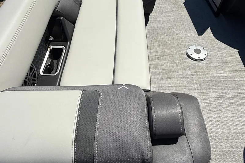 Slide: The Image of Viaggio LOGO Z22S-CC 2026 boat interior with gray seating and cup holders. - 12