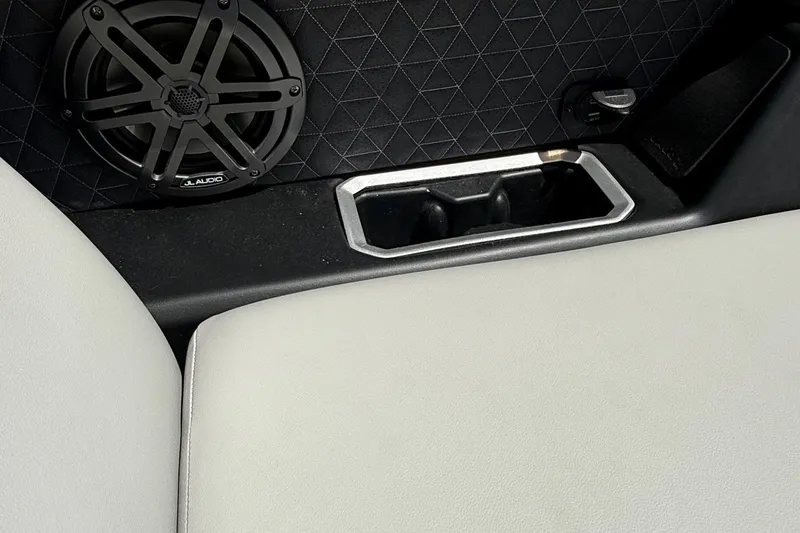 Slide: The Image of Interior of 2026 Viaggio LOGO Z22S-CC with speaker and cup holder. - 13