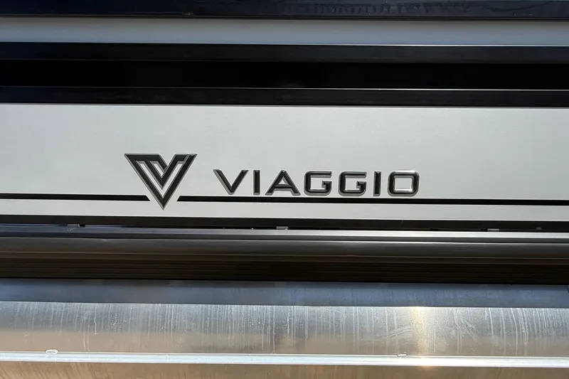 Slide: The Image of Viaggio LOGO Z22S-CC 2026 emblem on metallic surface. - 2