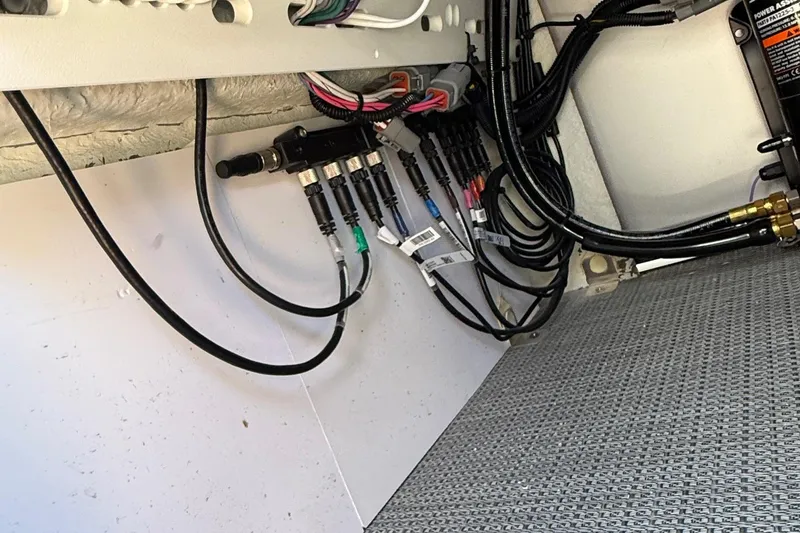 Slide: The Image of Electrical wiring and components inside a Viaggio LOGO Z22S-CC, 2026 model. - 20