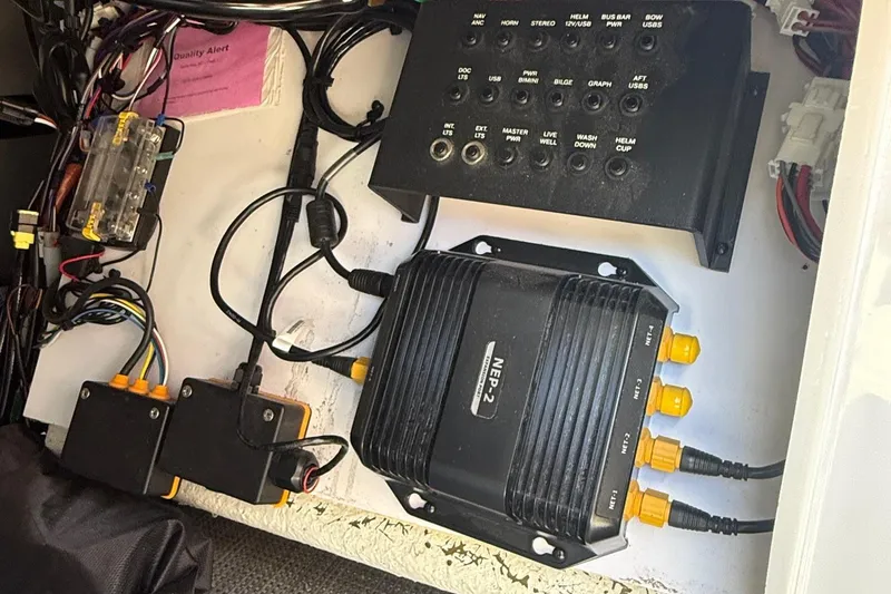 Slide: The Image of Electrical components and wiring inside a Viaggio LOGO Z22S-CC, 2026 model. - 22