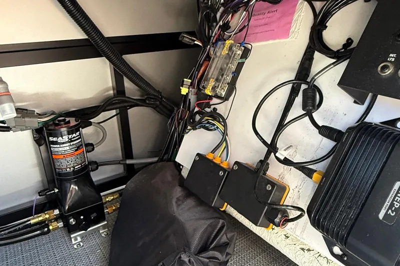 Slide: The Image of Interior view of Viaggio LOGO Z22S-CC 2026, showcasing wiring and hydraulic components. - 23