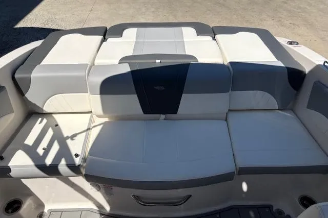Slide: The Image of 2023 Chaparral 21 SSi boat seating area with gray and white upholstery. - 6