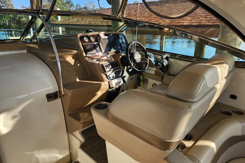 Slide: The Image of 2015 Formula 34 Performance Cruiser cockpit with luxurious seating and modern controls. - 34