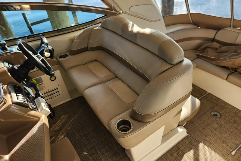 Slide: The Image of Interior of 2015 Formula 34 Performance Cruiser with beige seating and steering wheel. - 37