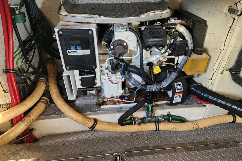 Slide: The Image of Engine compartment of a 2015 Formula 34 Performance Cruiser with Kohler generator. - 50