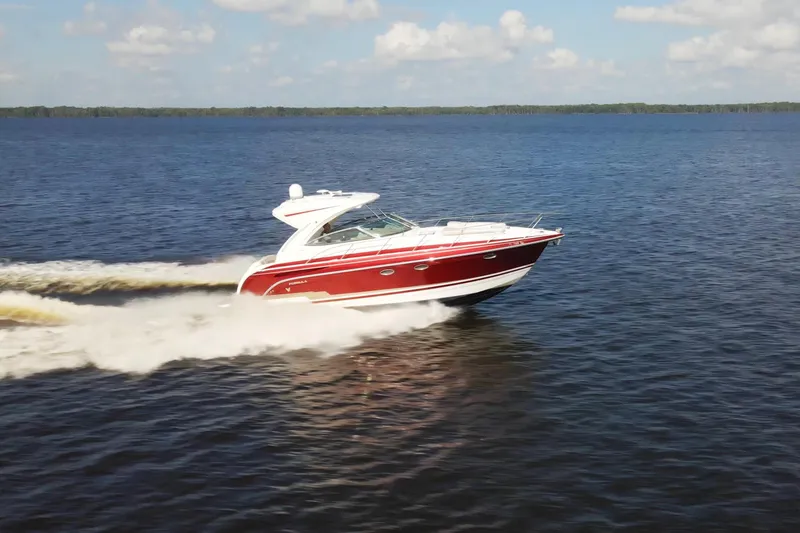 Slide: The Image of 2015 Formula 34 Performance Cruiser speeding on open water under a clear sky. - 9