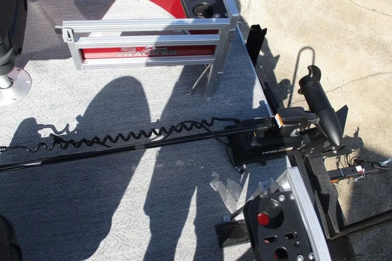 Slide: The Image of 2026 Sun Tracker Bass Buggy® 16 XL Select boat deck with trolling motor. - 11