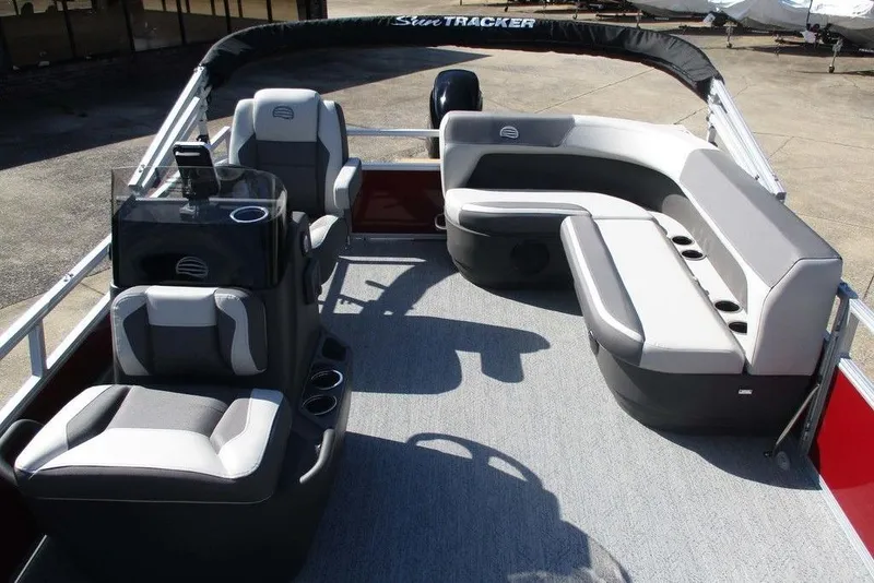 Slide: The Image of 2026 Sun Tracker Bass Buggy® 16 XL Select pontoon boat interior with gray seating. - 12