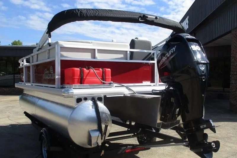 Slide: The Image of 2026 Sun Tracker Bass Buggy® 16 XL Select pontoon boat with Mercury outboard motor. - 3