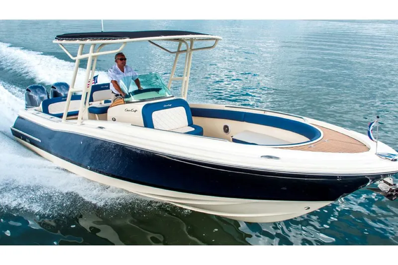 Slide: The Image of Manufacturer Provided Image: 2015 Chris-Craft Catalina 26 boat cruising on water. - 9