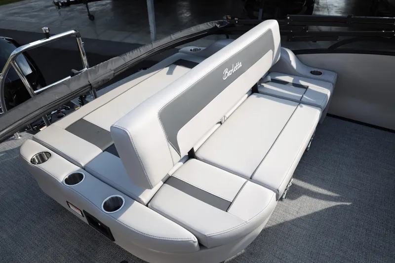 Slide: The Image of 2026 Barletta ARIA 22UC boat with luxurious seating and integrated cup holders. - 14