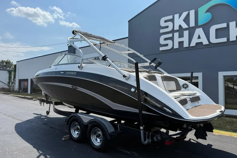 Slide: The Image of 2012 Yamaha Boats 242 Limited S on trailer at Ski Shack dealership. - 10