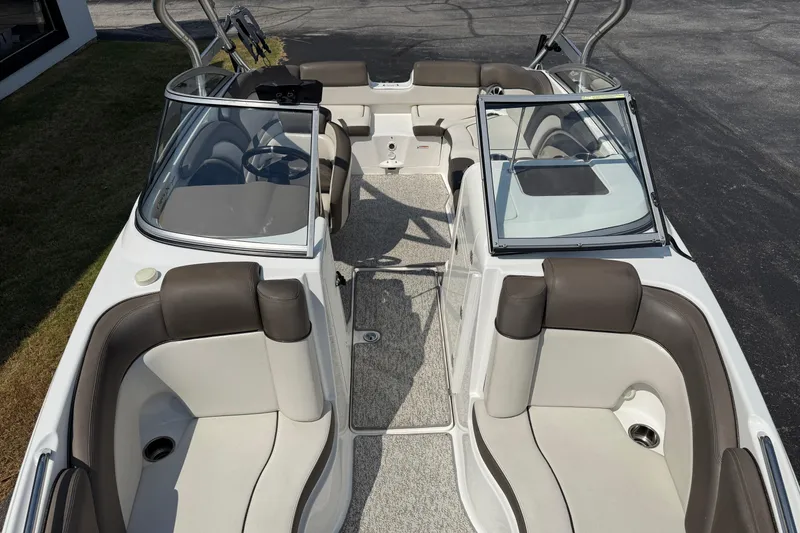 Slide: The Image of 2012 Yamaha Boats 242 Limited S interior with spacious seating and sleek design. - 15