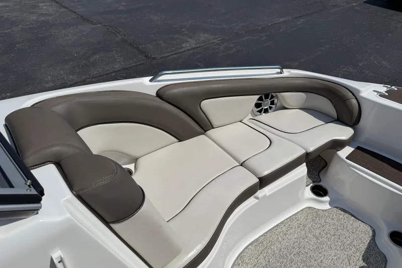 Slide: The Image of 2012 Yamaha Boats 242 Limited S interior seating with cushioned upholstery and speaker. - 17