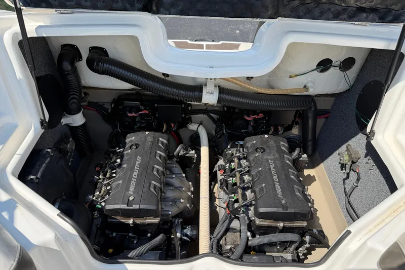 Slide: The Image of 2012 Yamaha Boats 242 Limited S engine compartment with dual high-output engines. - 31