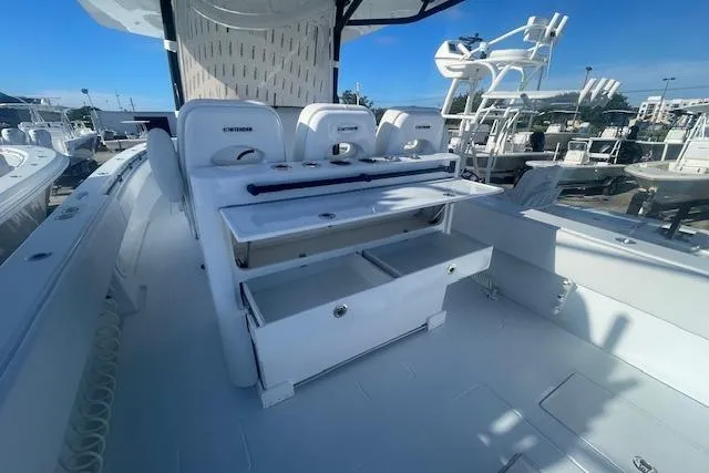 Slide: The Image of 2026 Contender 39 ST boat interior with seating and storage compartments. - 10