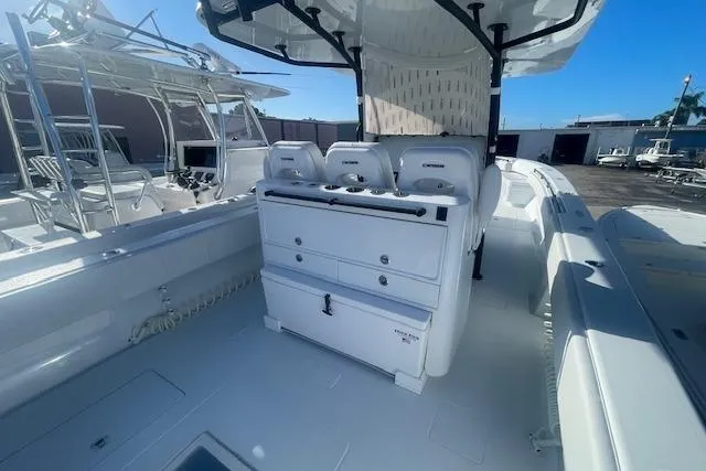 Slide: The Image of 2026 Contender 39 ST boat interior with seating and storage compartments. - 21