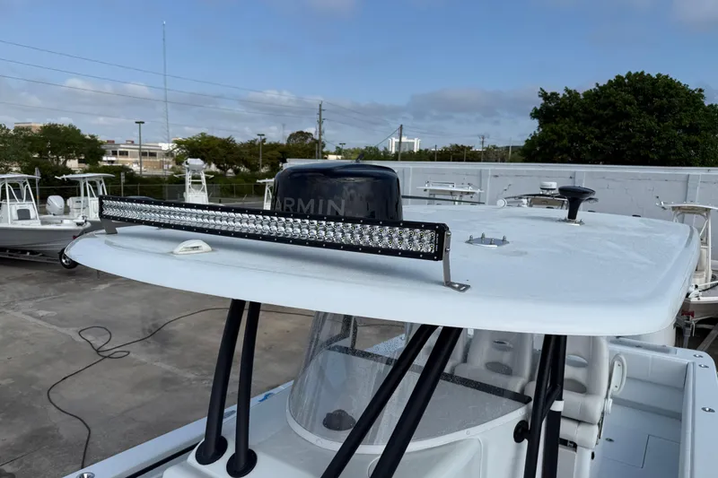Slide: The Image of 2026 Contender 39 ST boat with Garmin radar and LED light bar on the roof. - 25