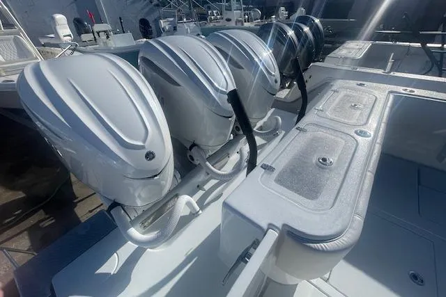 Slide: The Image of 2026 Contender 39 ST boat with multiple powerful outboard engines. - 6