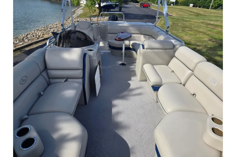 Slide: The Image of 2014 South Bay 522 FCR pontoon boat with spacious seating and elegant interior design. - 10