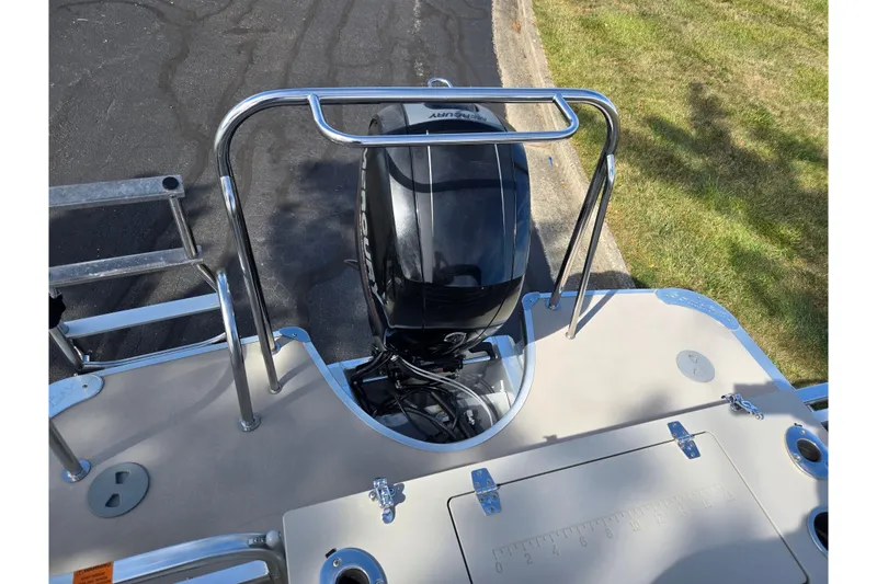 Slide: The Image of 2014 South Bay 522 FCR boat with Mercury outboard motor and ladder. - 18