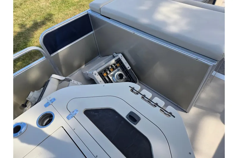 Slide: The Image of 2014 South Bay 522 FCR boat interior with seating and storage compartments. - 19