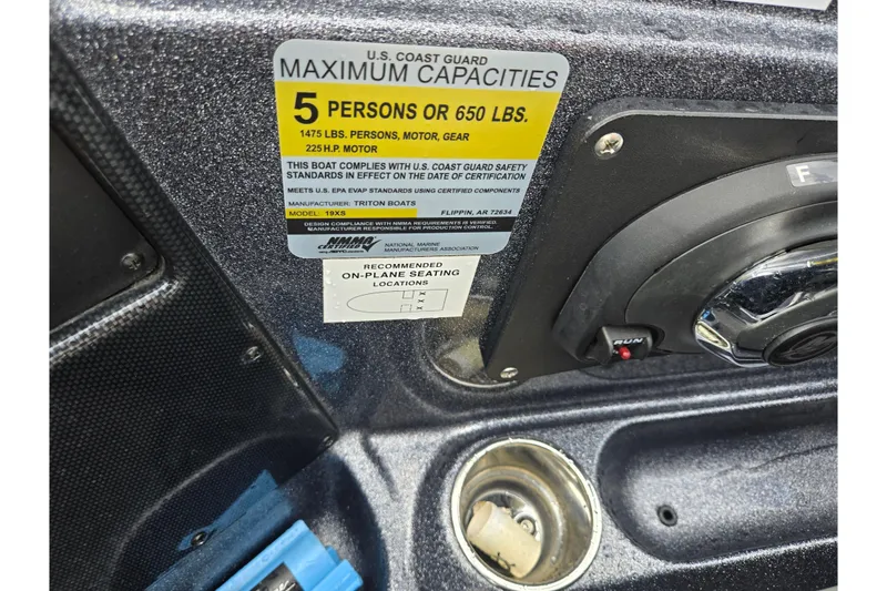 Slide: The Image of 2014 Triton 19XS boat capacity label, showing maximum 5 persons or 650 lbs, 225 HP motor. - 15
