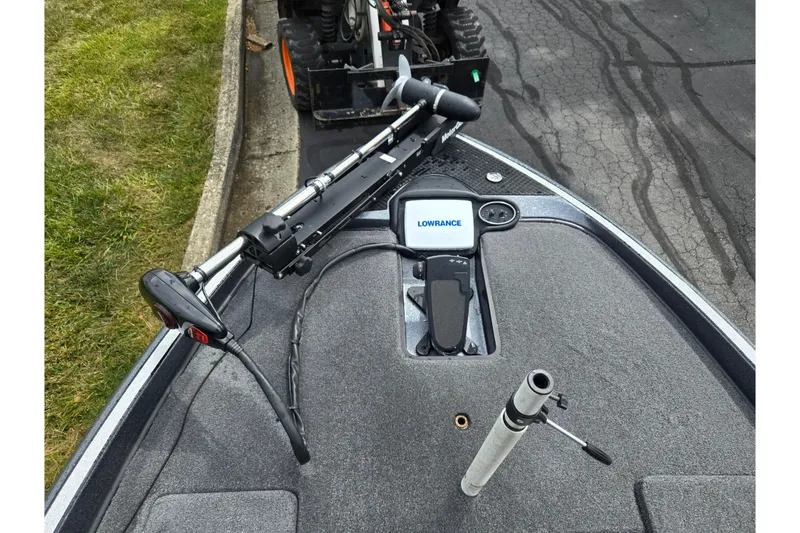 Slide: The Image of 2014 Triton 19XS boat deck with Lowrance fishfinder and trolling motor. - 18