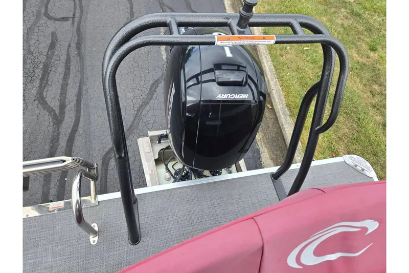 Slide: The Image of 2022 Crest Classic LX 220 boat with Mercury outboard motor, rear view. - 18