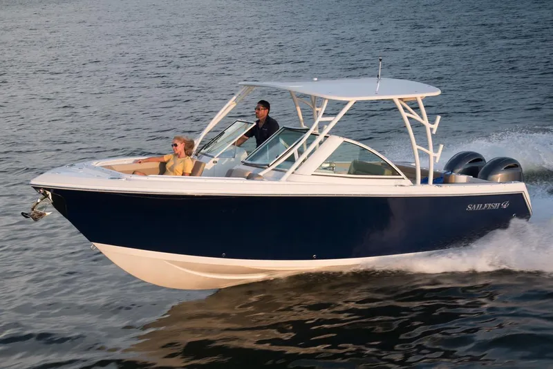 Slide: The Image of Manufacturer Provided Image: 2018 Sailfish 275 DC boat cruising on water. - 15