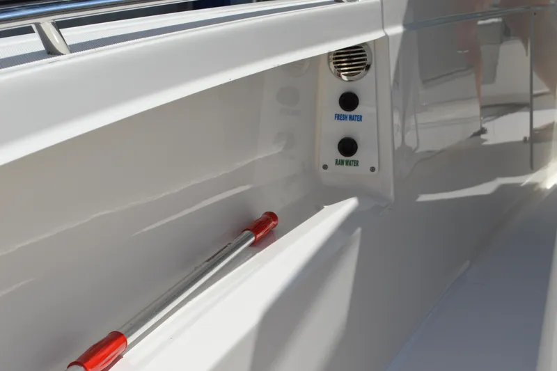 Slide: The Image of 2024 Tiara Yachts 34 LS boat interior with fresh and raw water controls. - 26