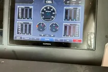 Slide: The Image of Garmin display on 2018 Axopar 37 XC CROSS CABIN showing engine metrics. - 23