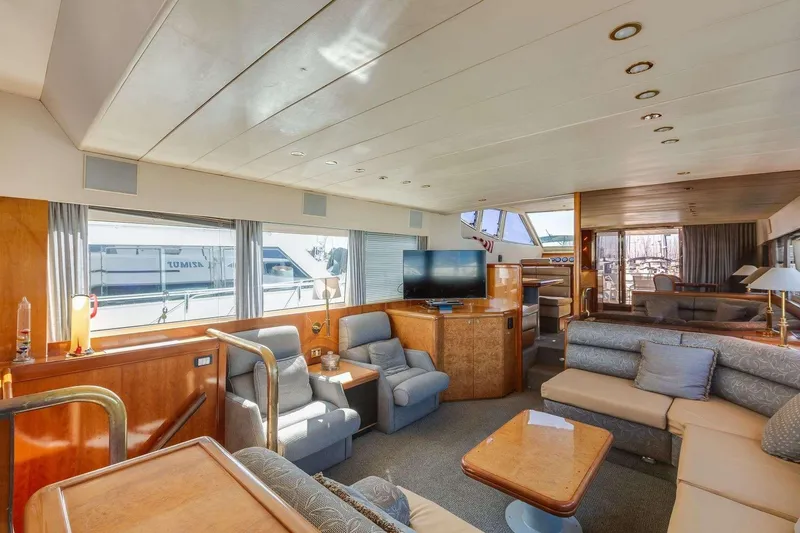 Slide: The Image of Luxurious interior of a 1988 Azimut Motor Yacht with elegant seating and modern amenities. - 2