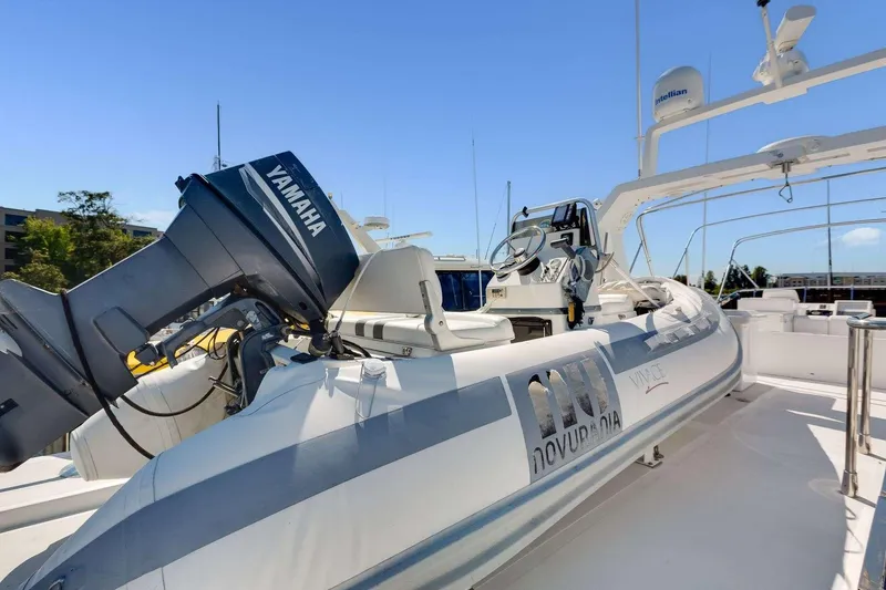 Slide: The Image of 1988 Azimut Motor Yacht with Yamaha engine, featuring a sleek design and spacious deck. - 26