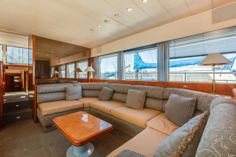 Slide: The Image of Luxurious interior of 1988 Azimut Motor Yacht with plush seating and elegant decor. - 4