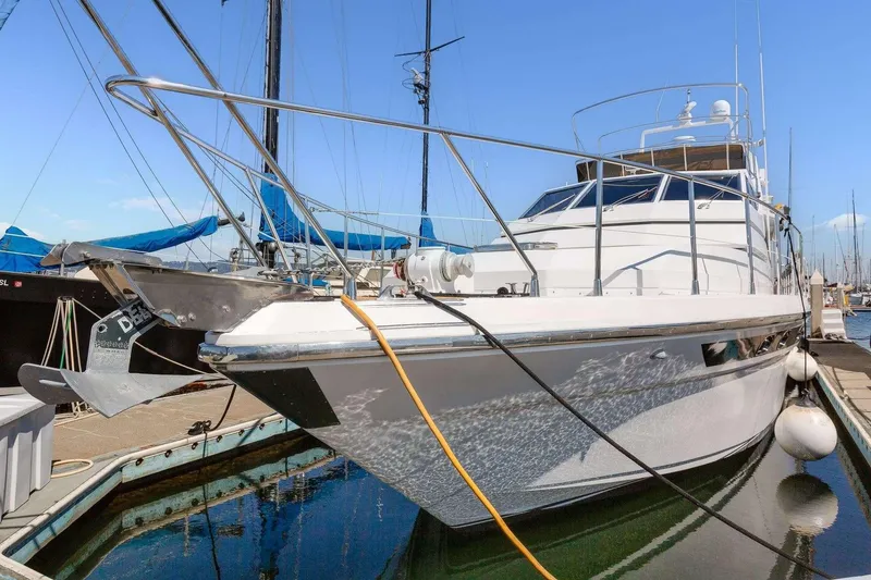 Slide: The Image of 1988 Azimut Motor Yacht docked at marina, featuring sleek design and modern amenities. - 44