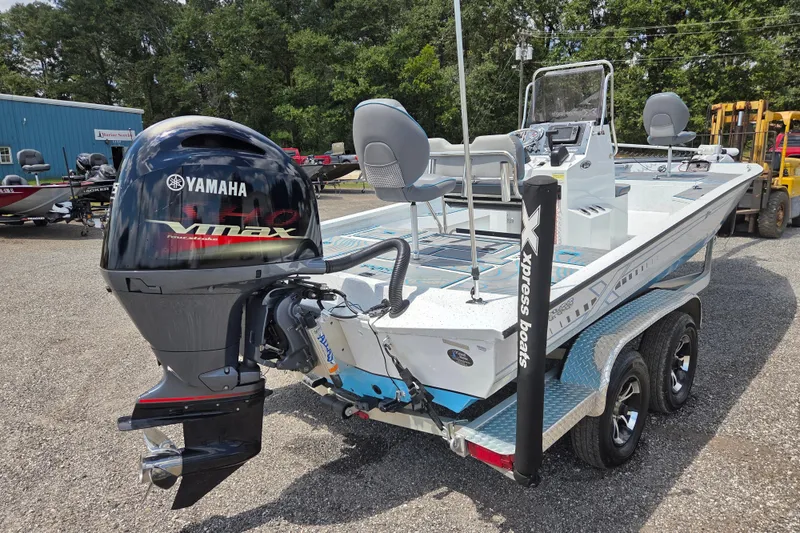 Slide: The Image of 2022 Xpress H22B boat with Yamaha VMAX engine on a trailer. - 5
