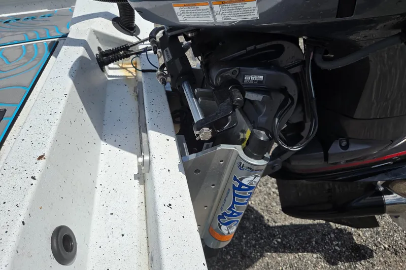 Slide: The Image of 2022 Xpress H22B boat with Atlas hydraulic jack plate and motor detail. - 8