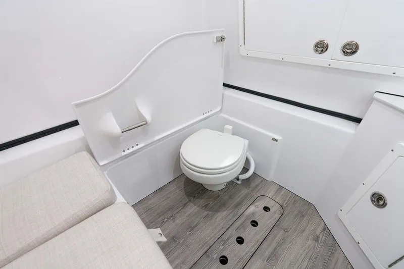 Slide: The Image of Manufacturer Provided Image: 2022 Sportsman Open 352 Center Console boat bathroom with modern amenities. - 22